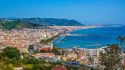 an aerial view of the coastal city of Salerno, Italy