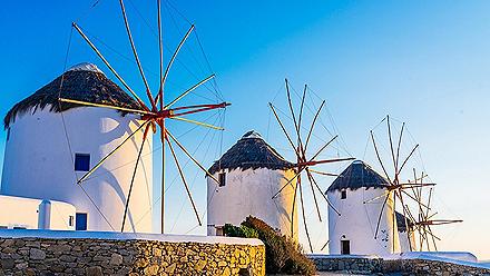 Famous windmills during sunset in Mykonos, Greece