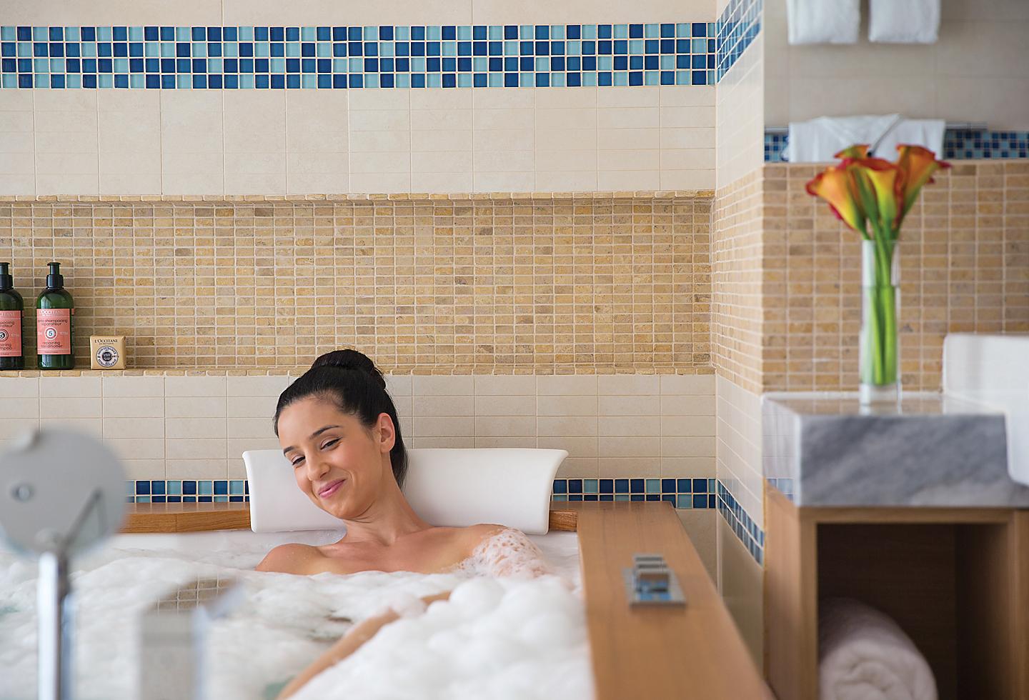 Woman Relaxing and Taking Bubble Bath