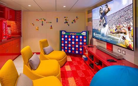 The game room with movies and toys in the Ultimate Family Suite